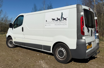 Hondenuitlaatservice bus